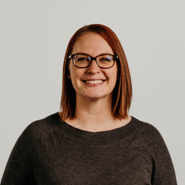 Professional headshot of Kristy Henriques, part of Sevenstar Academy’s leadership team, posed against a neutral backdrop.