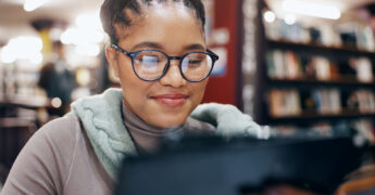 african-woman-smile-with-tablet-library-research-information-university-news-study-schedule-student-digital-reading-online-with-education-ebook-exam-results-project-report